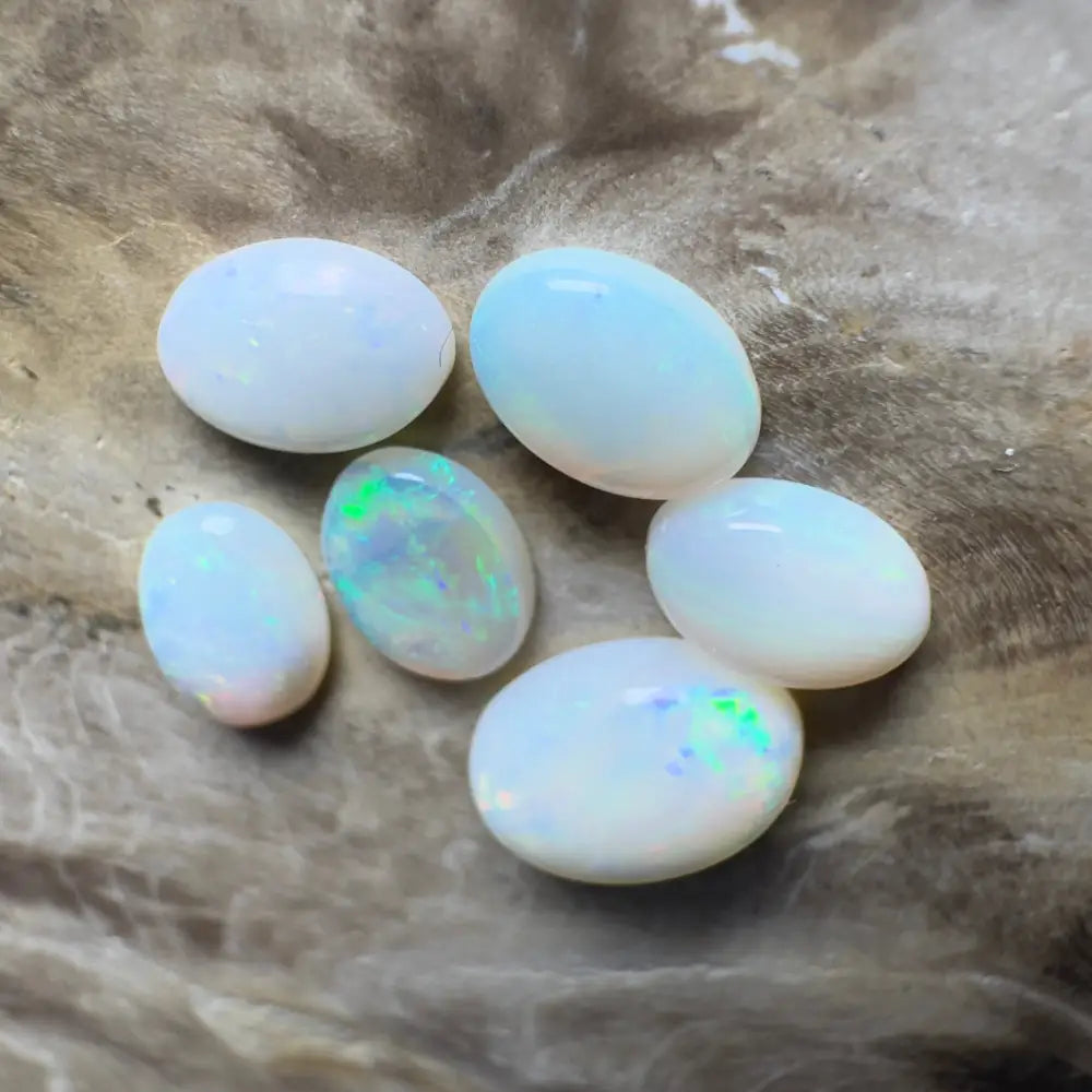 Six oval opals.