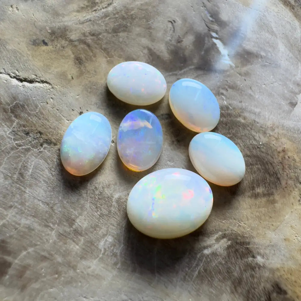Six oval opals.