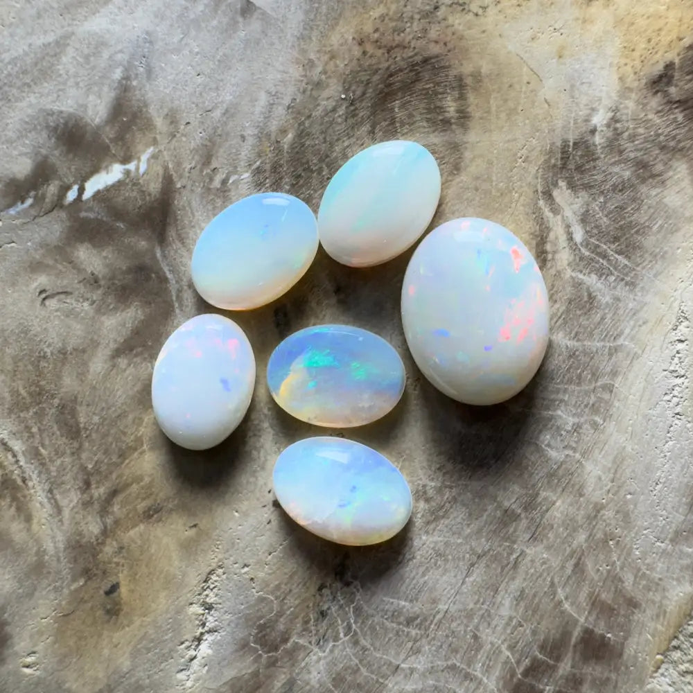 Six oval opals.