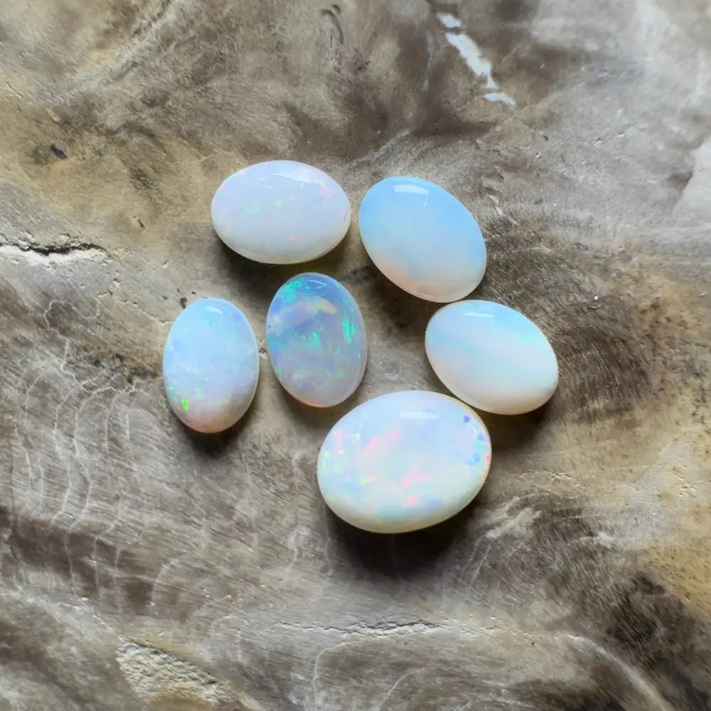 Six oval opals.