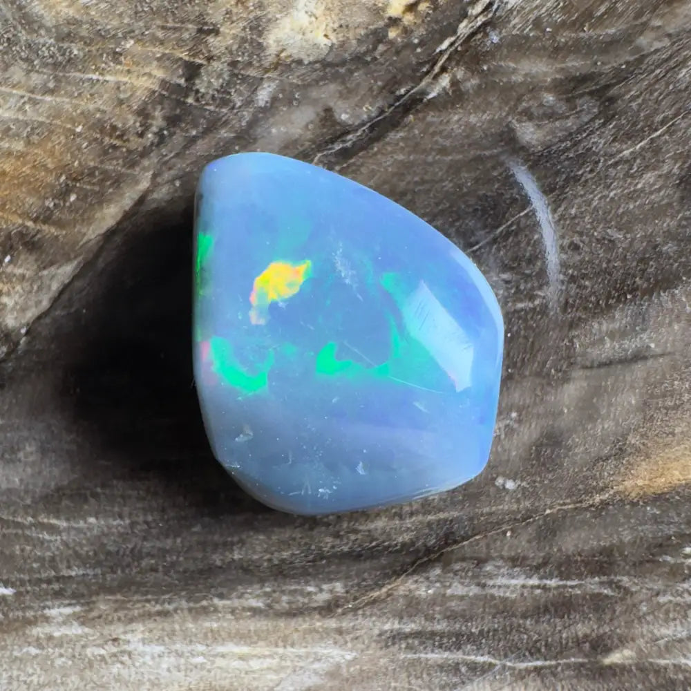 Iridescent blue opal cabochon.