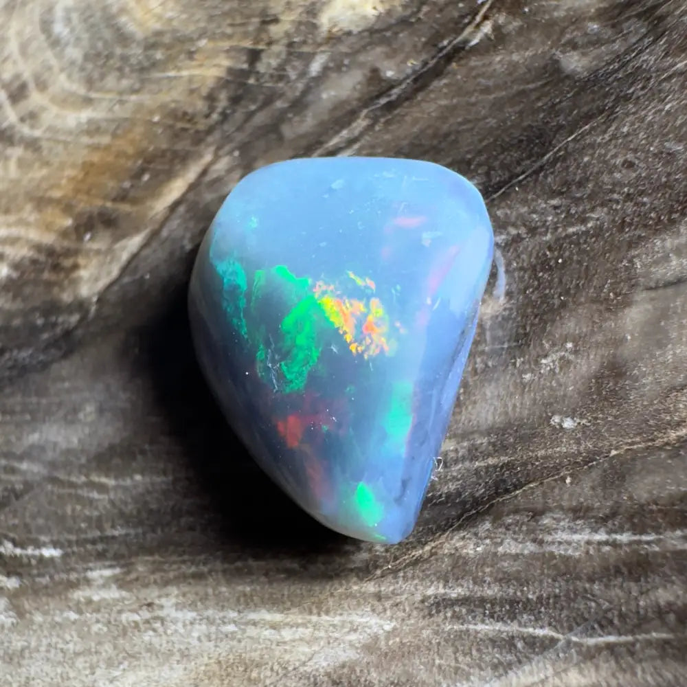 Iridescent blue opal cabochon.