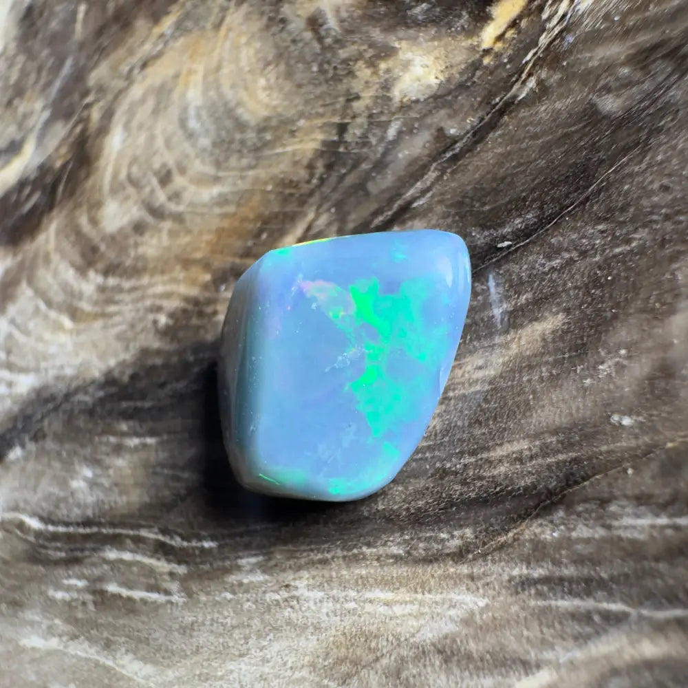 Polished blue opal with green play-of-color.