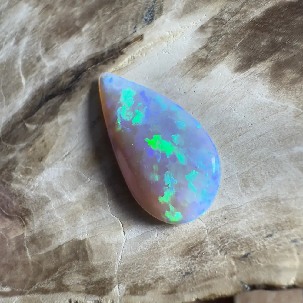 Iridescent teardrop-shaped opal.