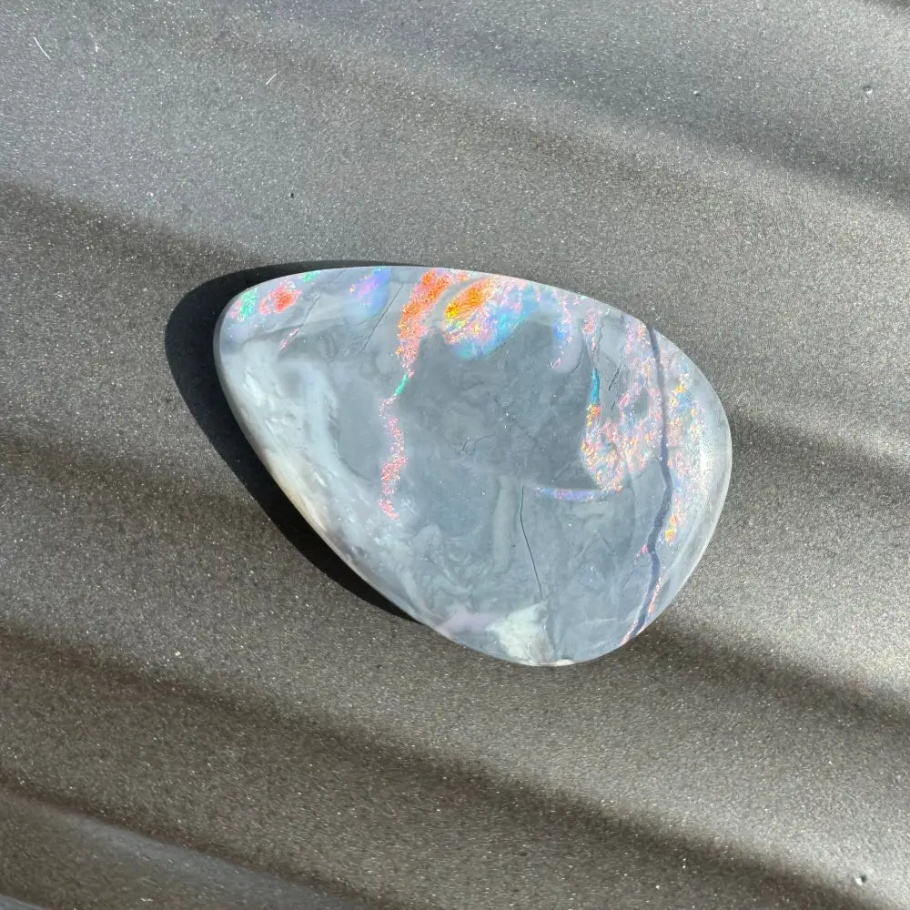 Iridescent gray opal cabochon from 5.7 carat Hand-Cut Solid Lightning Ridge Semi Black Opal