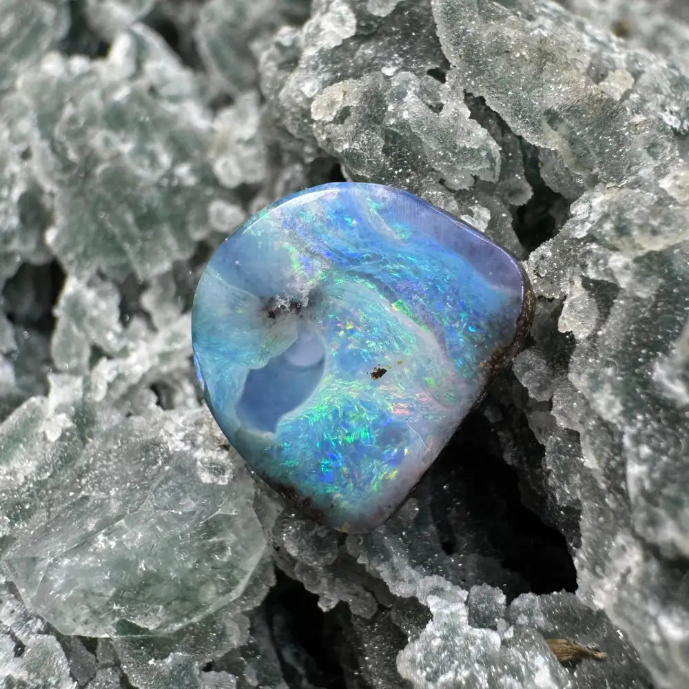 Iridescent blue opal gemstone from the 5.9ct Hand-cut Queensland Boulder Opal collection