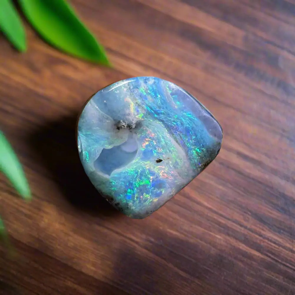 Iridescent Queensland Boulder Opal gemstone in a 5.9ct hand-cut jewelry piece