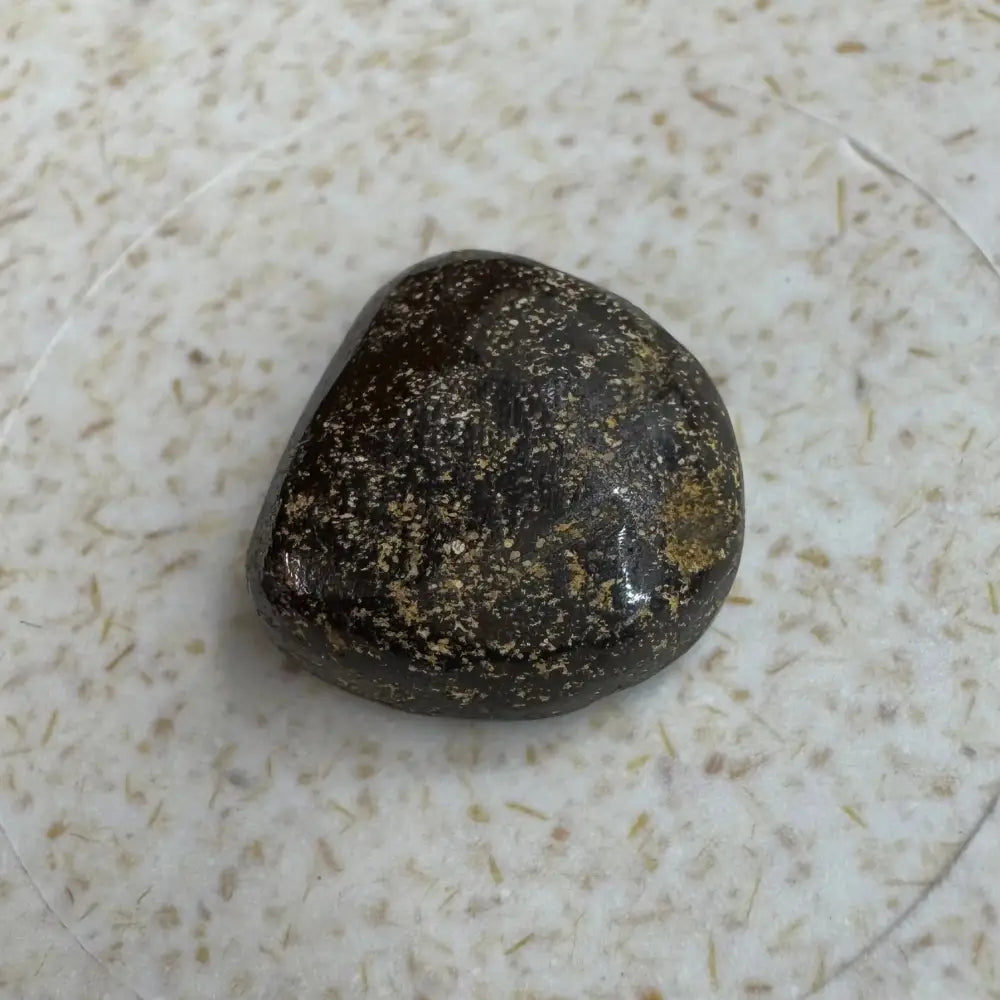 Polished dark speckled stone from 5.9ct Hand-cut Queensland Boulder Opal