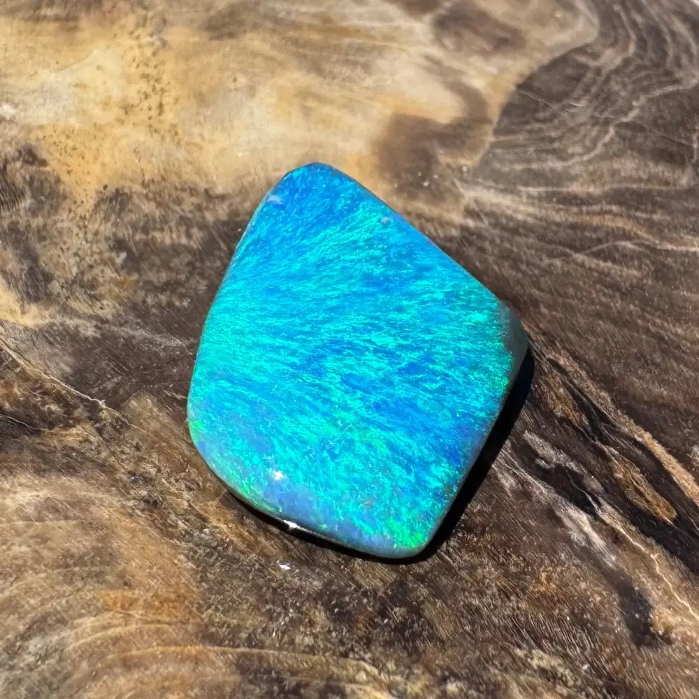 5.6ct Lightning Ridge Black Opal Solid Hand - Cut
