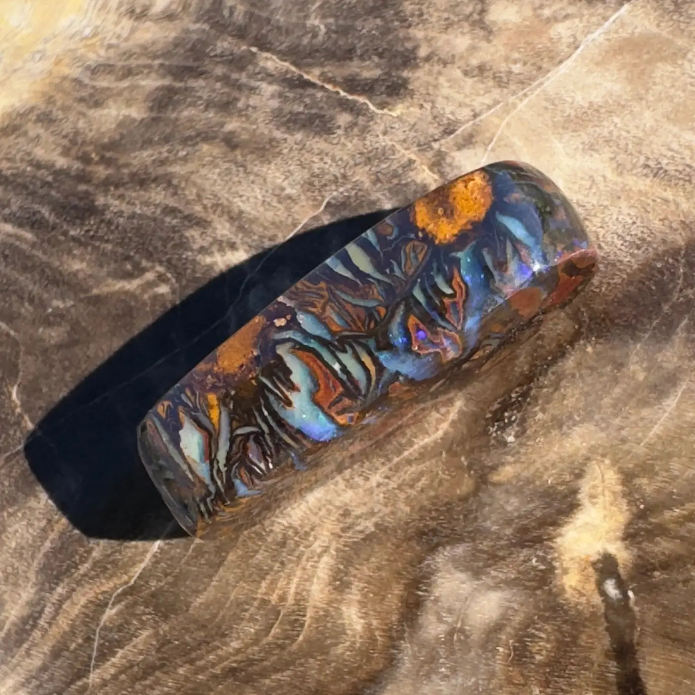 Polished Boulder Opal with vibrant color play for 8.3ct Hand-Cut Solid Boulder Opal gemstone