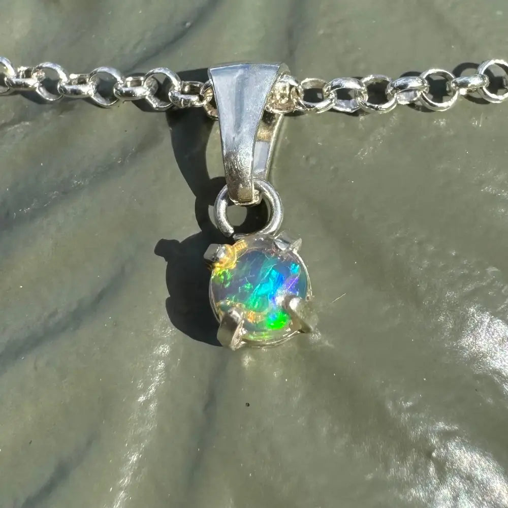 Silver chain necklace featuring a handcrafted 0.2ct Lightning Ridge Opal pendant