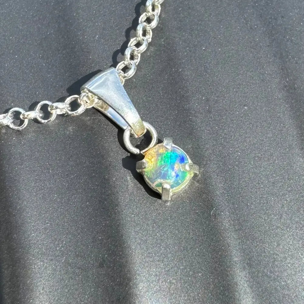 Silver chain necklace with iridescent Lightning Ridge Opal pendant for elegant jewelry