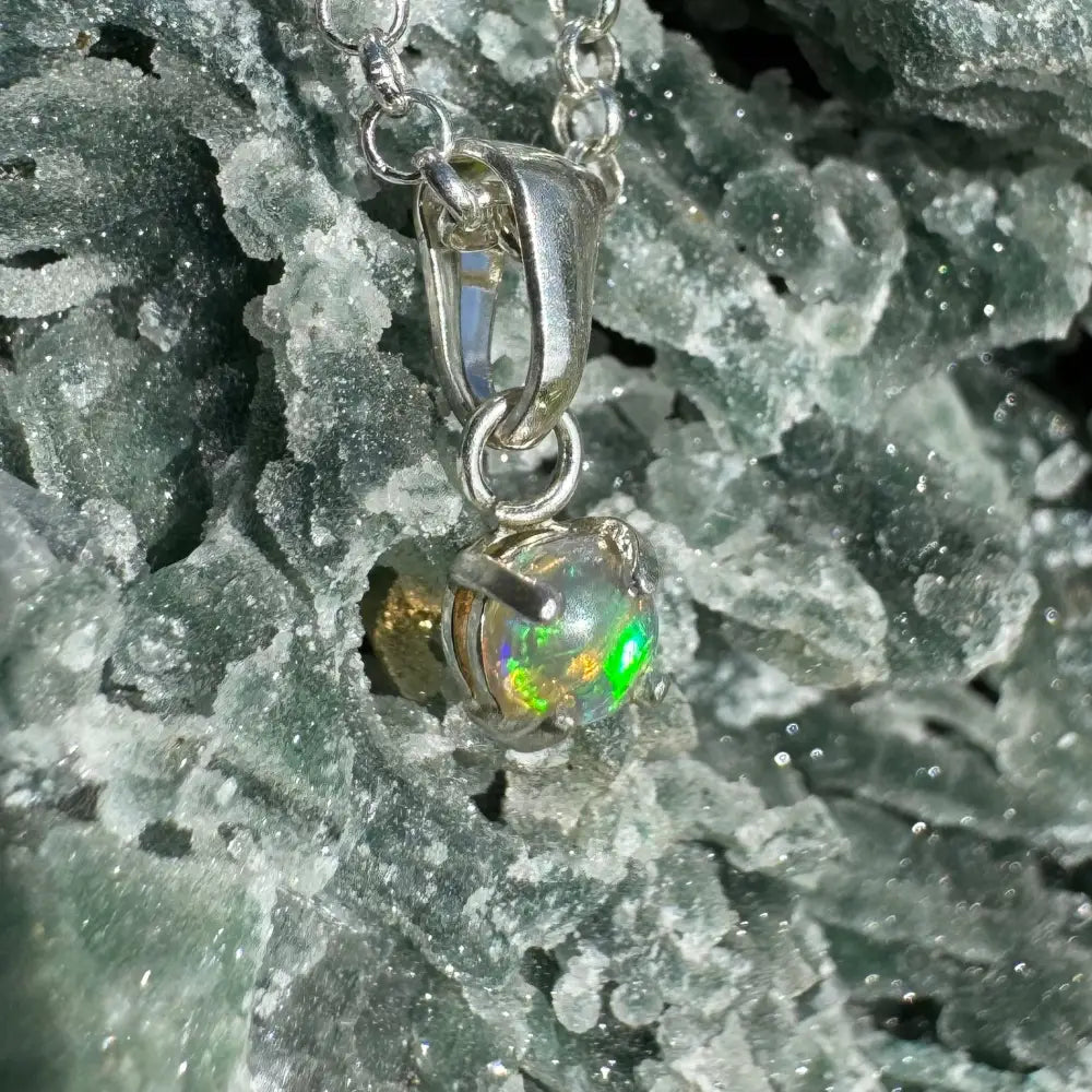 Silver opal pendant necklace from Barrier Reef Bliss featuring handcrafted lightning Ridge opal