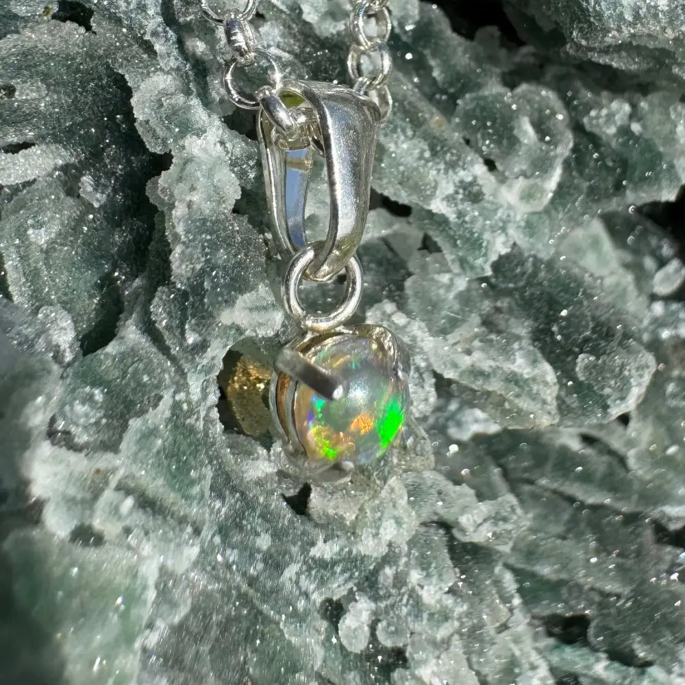 Silver opal pendant necklace featuring a handcrafted 0.2ct Lightning Ridge Opal in Sterling Silver