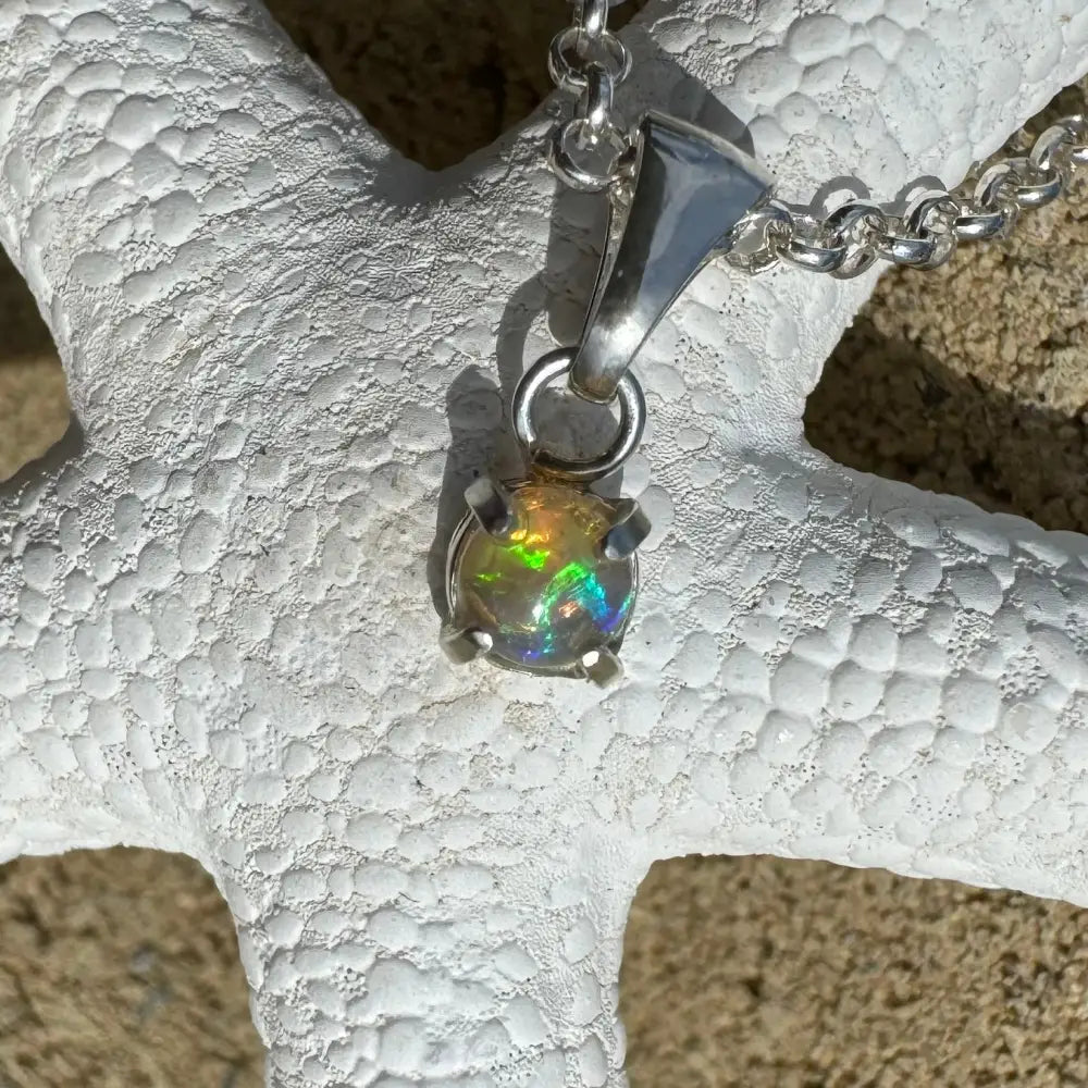 Iridescent opal pendant with silver chain from Barrier Reef Bliss handcrafted Lightning Ridge opal