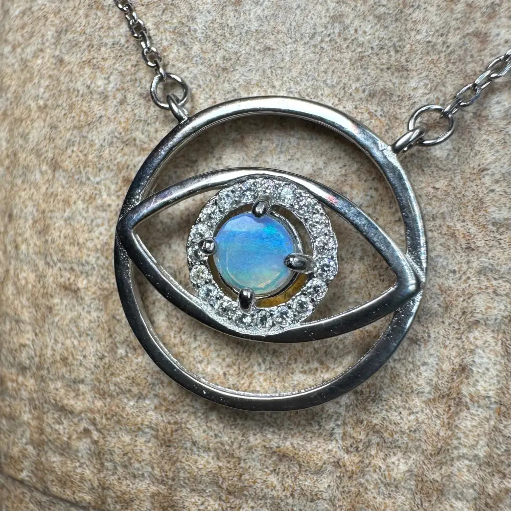 Silver eye pendant with exquisite opal center from Blue Eye Opal Oasis necklace