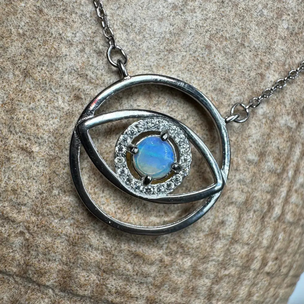 Silver eye pendant necklace with luminous opal center in 925 sterling silver design