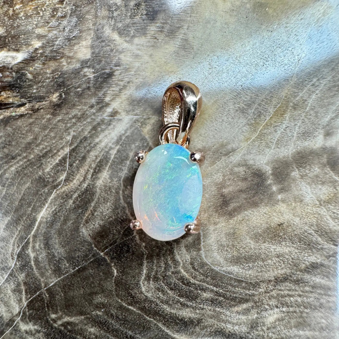 Blue Water Cove handcrafted 0.8ct Lightning Ridge Opal pendant in rose gold setting