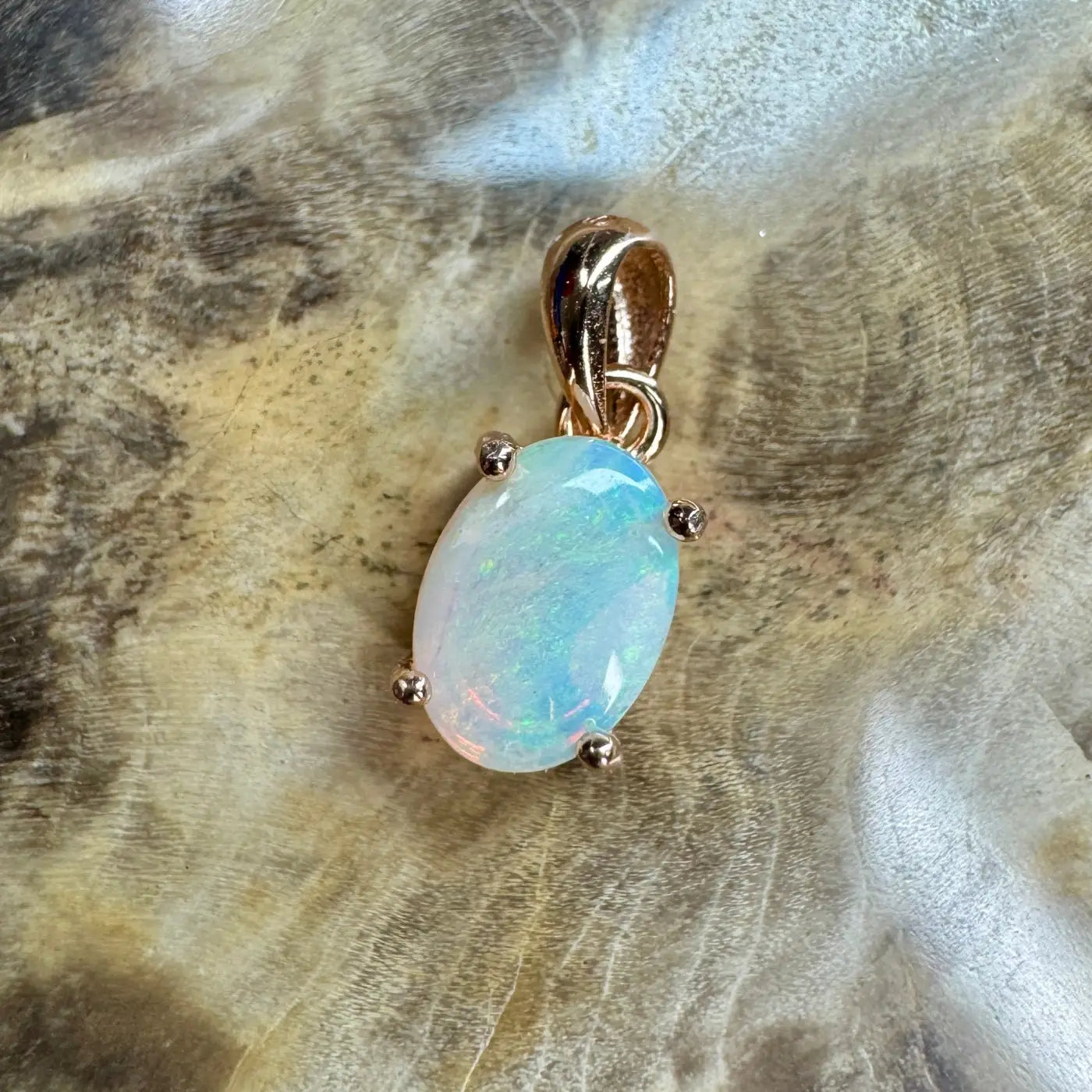 Oval opal pendant with gold setting from Blue Water Cove handcrafted 0.8ct Lightning Ridge Opal