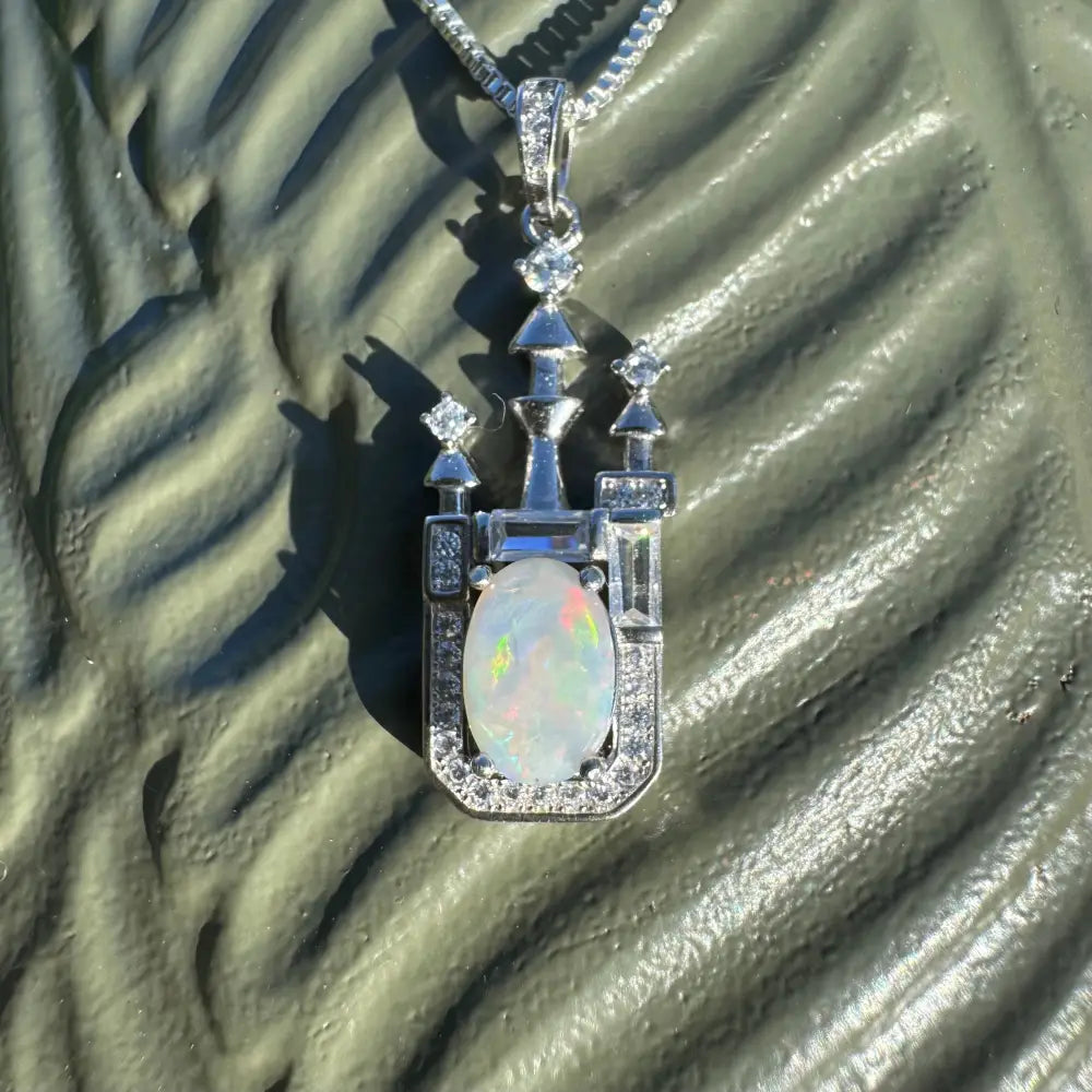 Opal castle pendant necklace featuring lightning Ridge opal, cubic zirconia, and sterling silver