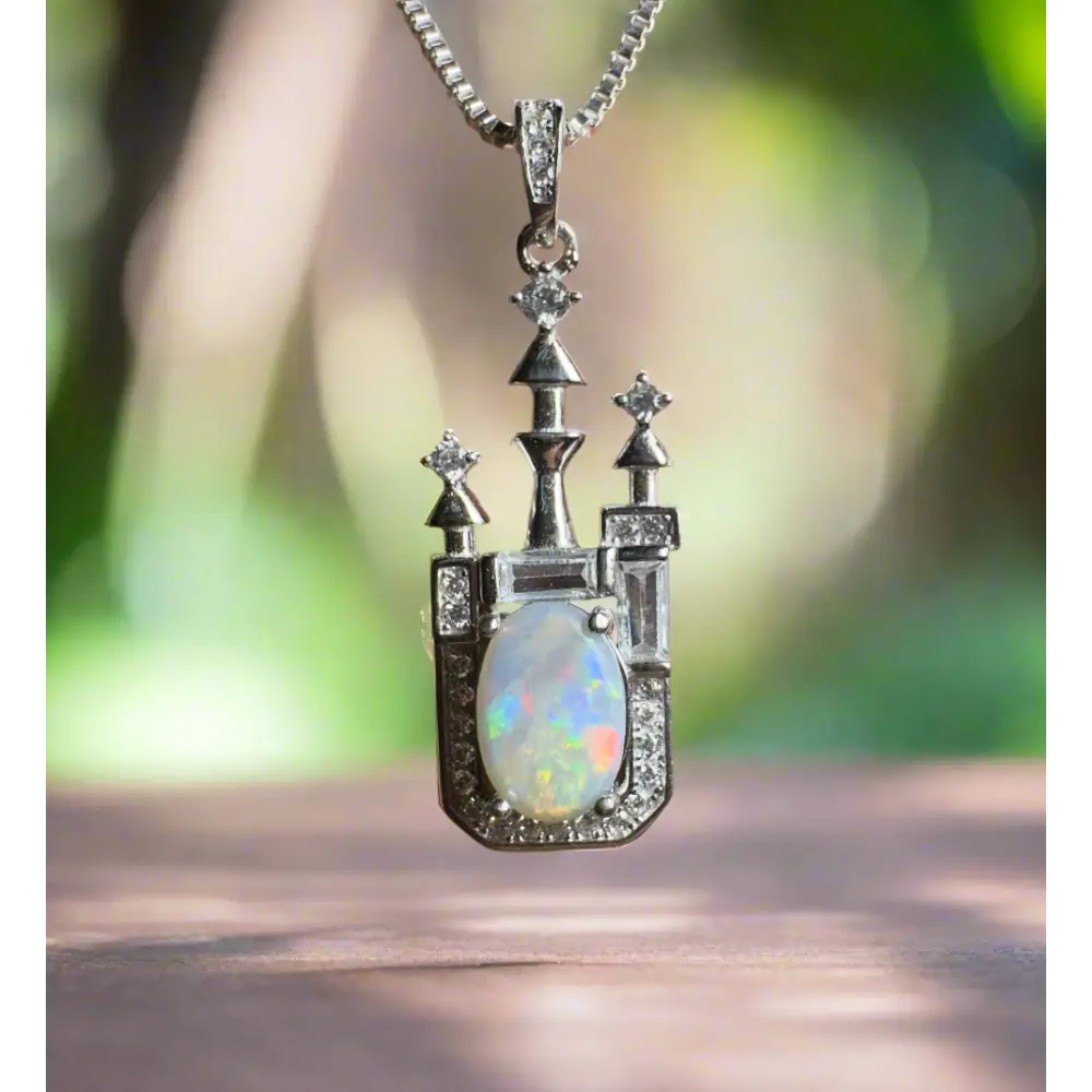 Opal castle pendant necklace featuring lightning ridge opal and cubic zirconia in silver