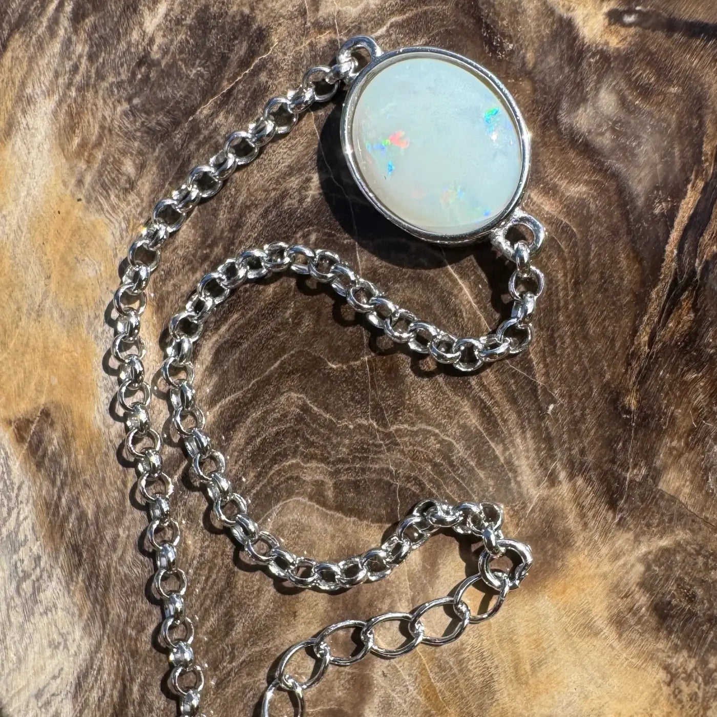 Silver chain necklace with a handcrafted Coober Pedy opal pendant from Celestial Reef collection