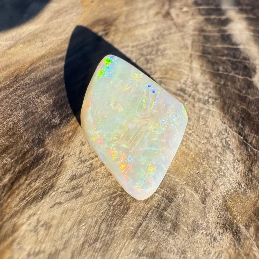 Iridescent opal gemstone from Coober Pedy Belemnite Opal 2.1 carats in the product image