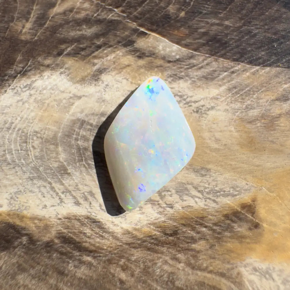 Iridescent white opal gemstone from Coober Pedy Belemnite Opal 2.1 carats solid