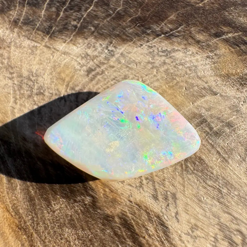 Iridescent white opal gemstone from Coober Pedy Belemnite Opal 2.1 carat Fossilised Squid jewelry