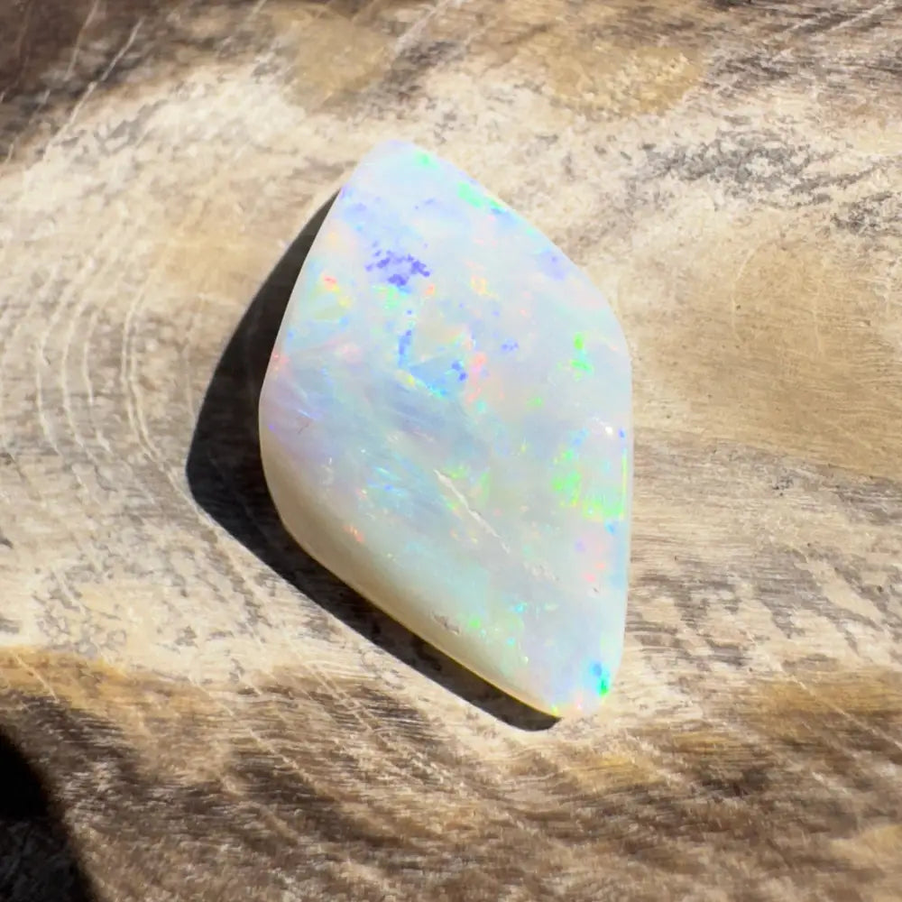 Iridescent white opal gemstone in the Coober Pedy Belemnite Opal 2.1 carats