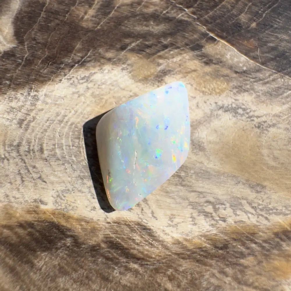 Iridescent opal gemstone from Coober Pedy Belemnite Opal fossil in a 2.1 carat solid setting