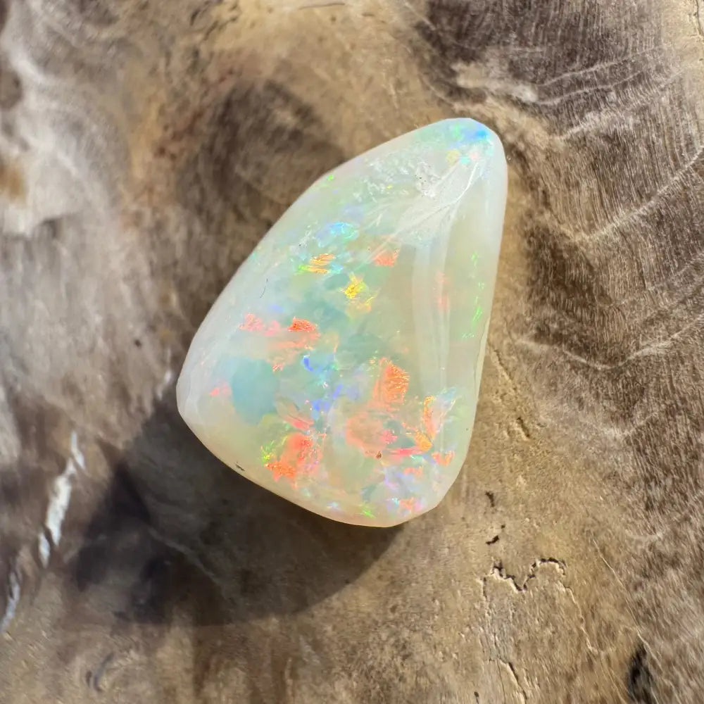 Iridescent Coober Pedy Opal gemstone displayed in the 3.3carat solid hand-cut product