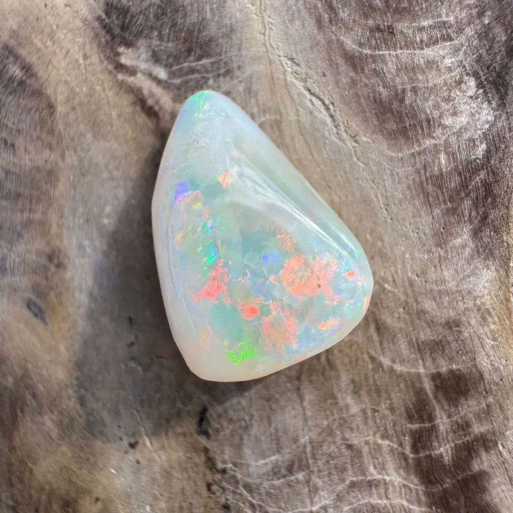 Polished Coober Pedy Opal 3.3 carat solid hand-cut gemstone with iridescent flashes