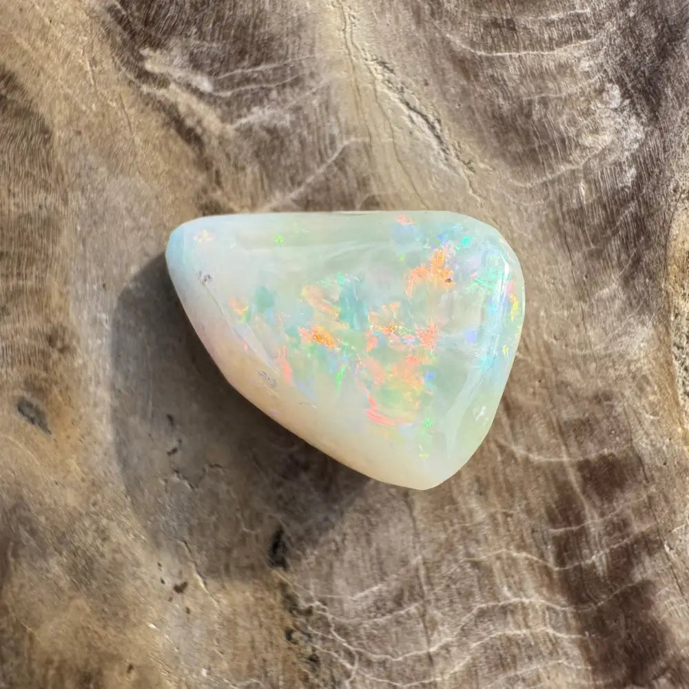 Polished Coober Pedy Opal 3.3 carat solid hand-cut gemstone with iridescent play-of-color