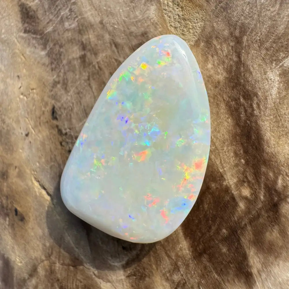 Iridescent white opal gemstone from Coober Pedy 8.4 carat solid hand-cut product