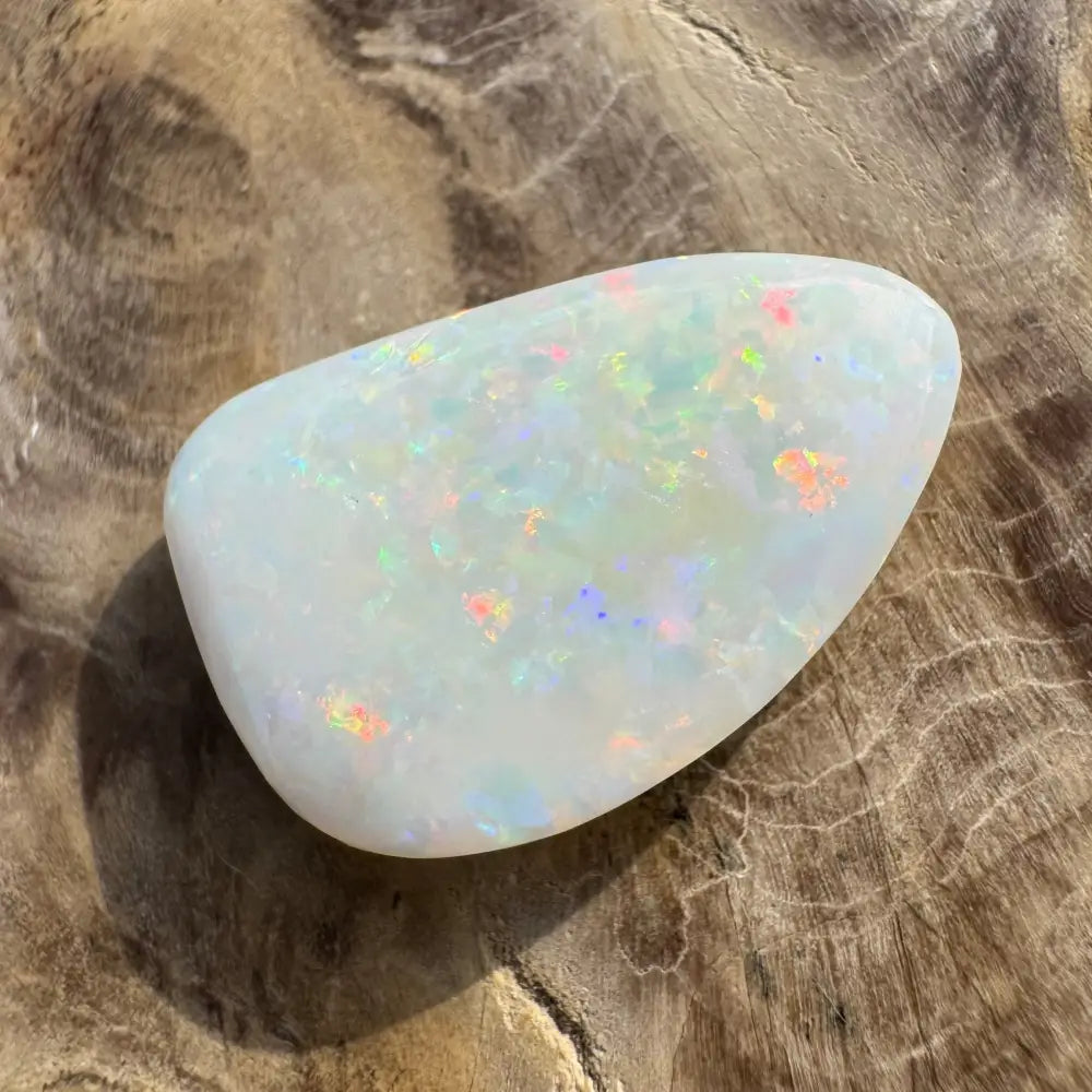 Iridescent white opal cabochon from Coober Pedy Opal 8.4 carat solid hand-cut gemstone