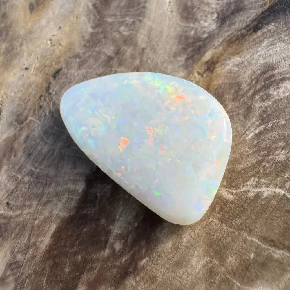 Iridescent white opal gemstone from Coober Pedy 8.4 carats hand-cut solid product