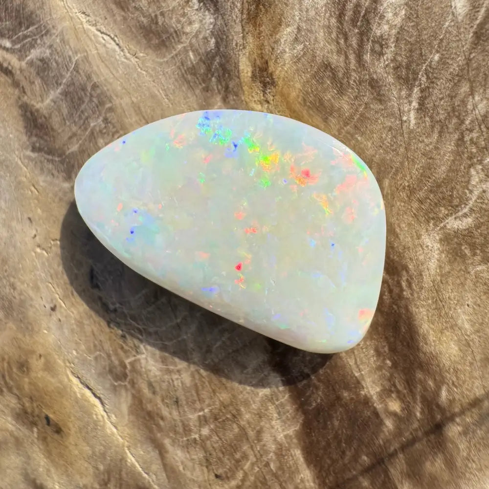 Iridescent white opal cabochon from Coober Pedy Opal 8.4 carat solid hand-cut product