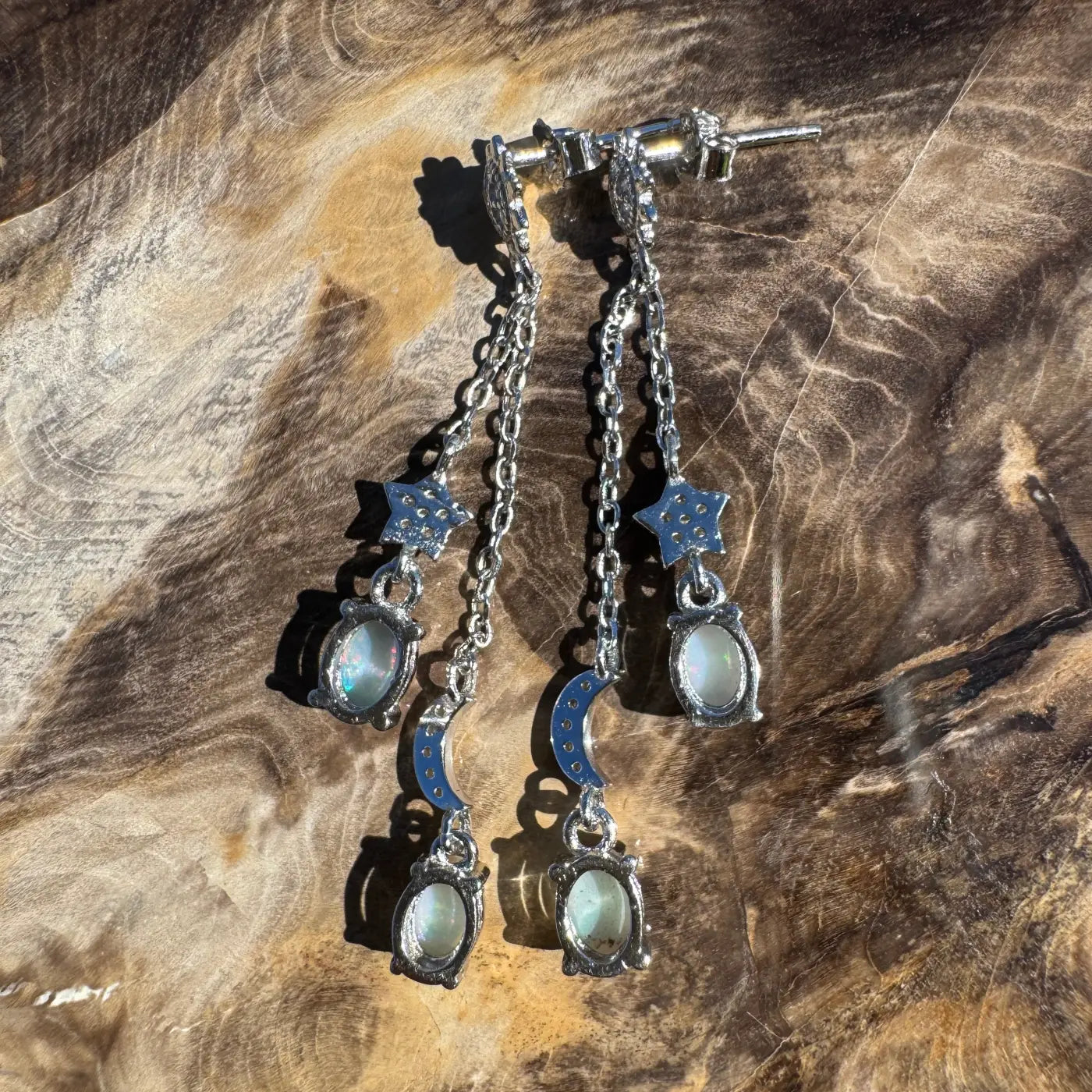 Silver celestial dangle earrings with Coober Pedy Opal, Lightning Ridge Opal, and Cubic Zirconia
