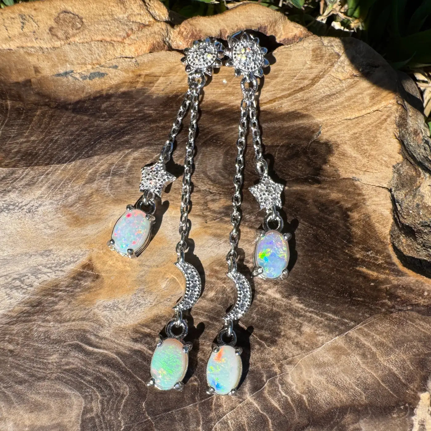 Silver opal dangle earrings featuring Coober Pedy and Lightning Ridge opals with cubic zirconia