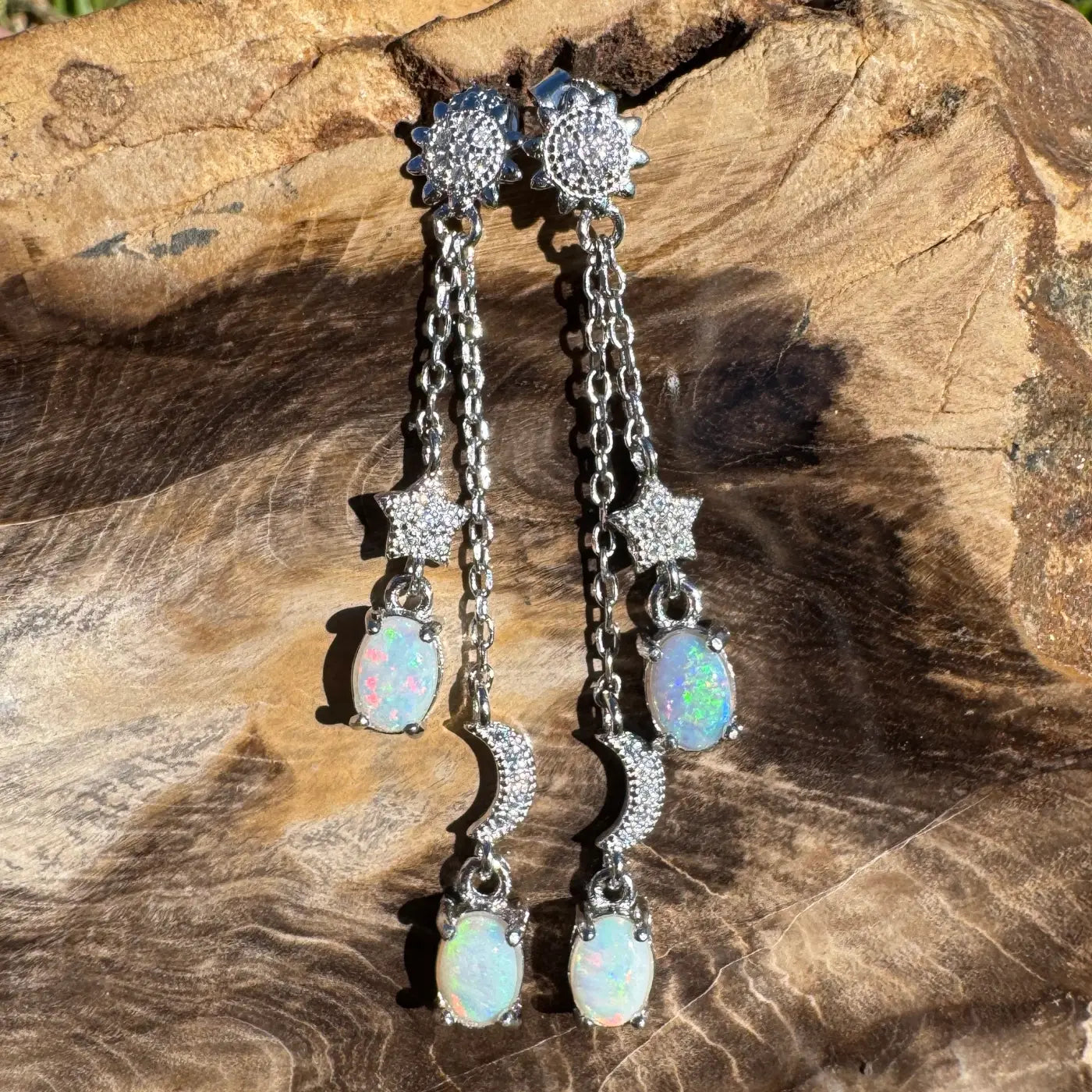 Silver celestial-themed opal earrings featuring Coober Pedy and Lightning Ridge opals