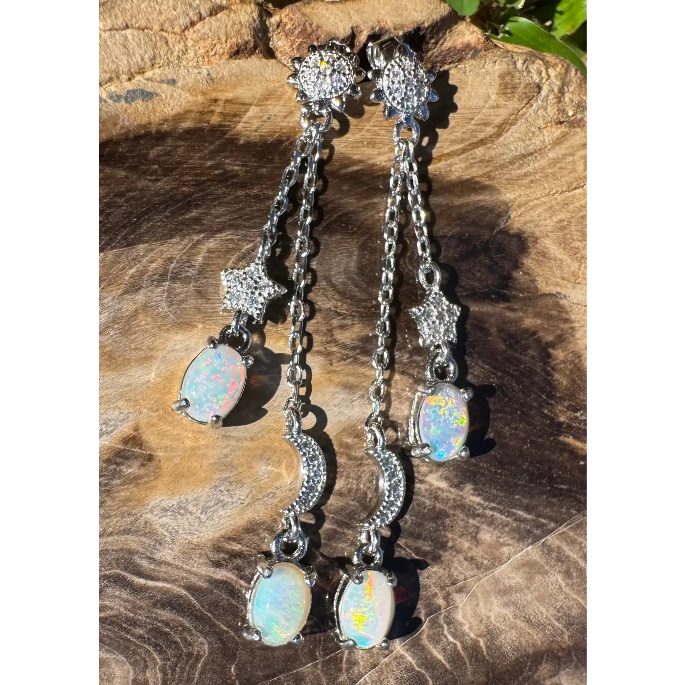 Silver opal dangle earrings featuring Coober Pedy and Lightning Ridge opals and cubic zirconia