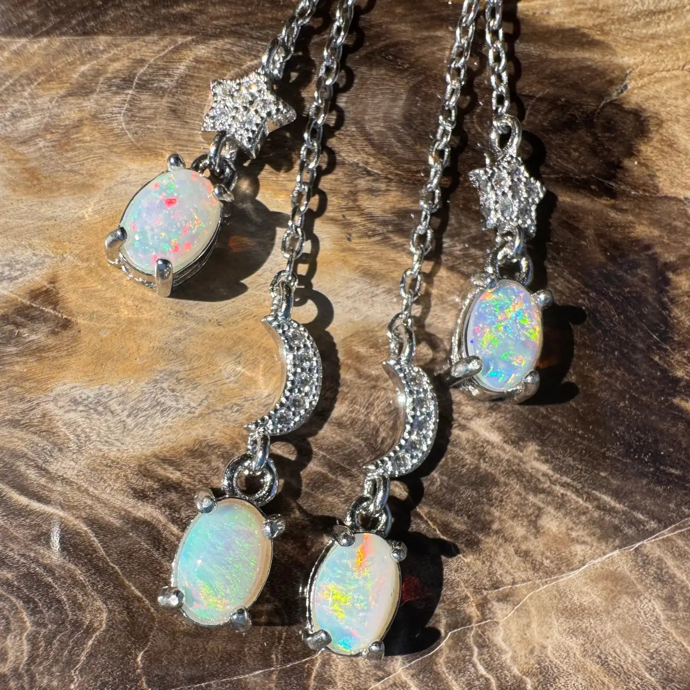 Opal and silver handcrafted earrings featuring Coober Pedy and Lightning Ridge Opals