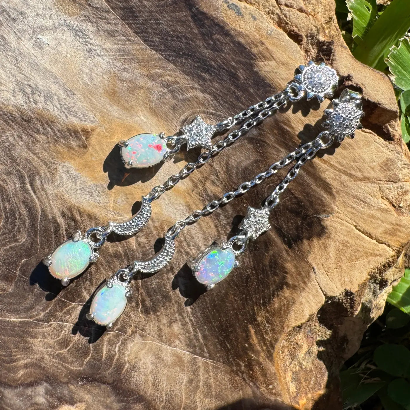Dangling opal earrings from Coober Ridge Echos featuring 1.6ct Coober Pedy and Lightning Ridge opals