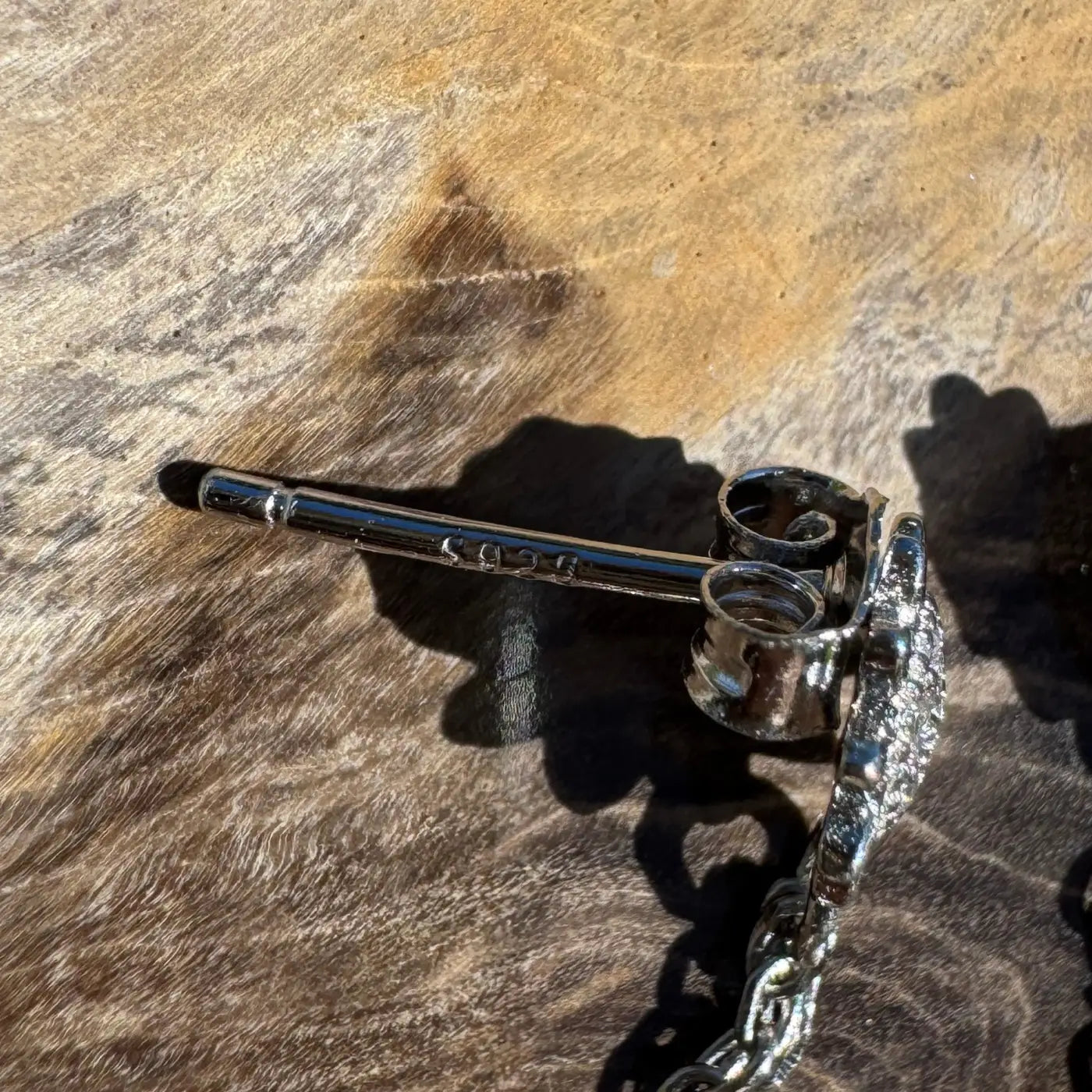 Silver earring with post featuring Coober Ridge Echos handcrafted opal and cubic zirconia