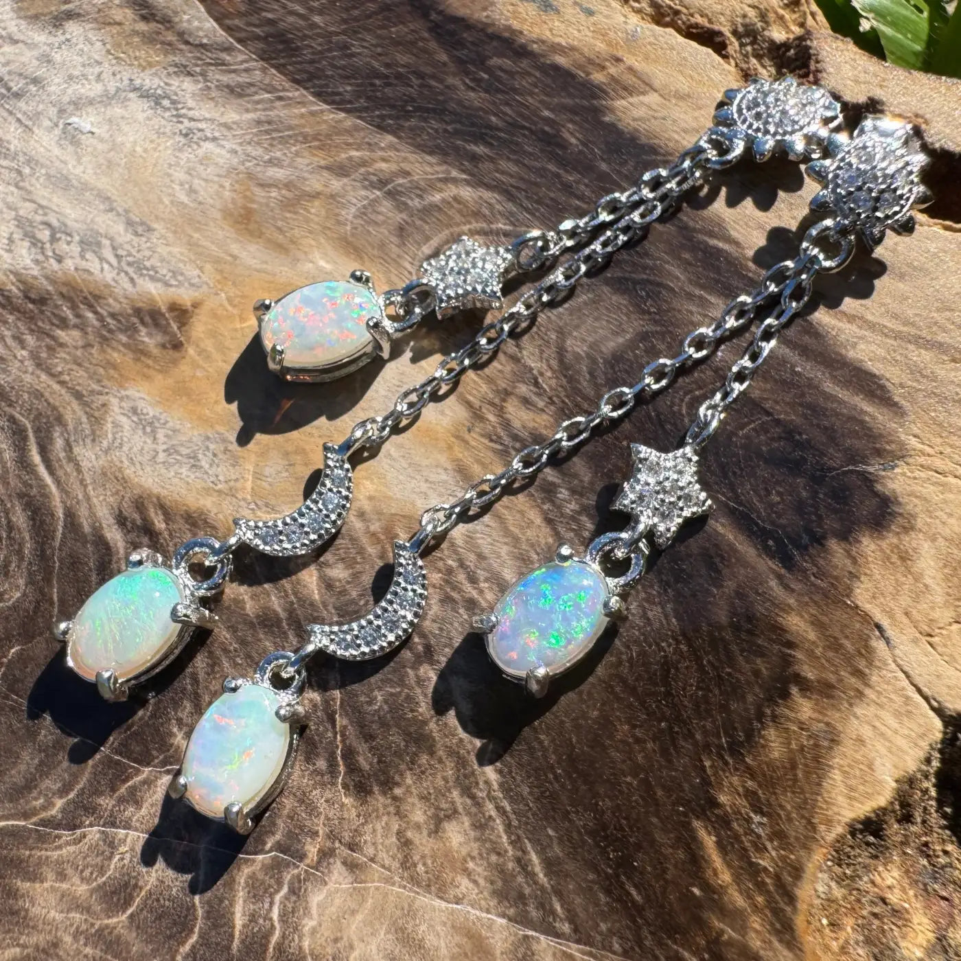 Silver opal dangle earrings featuring handcrafted Coober Pedy and Lightning Ridge opals
