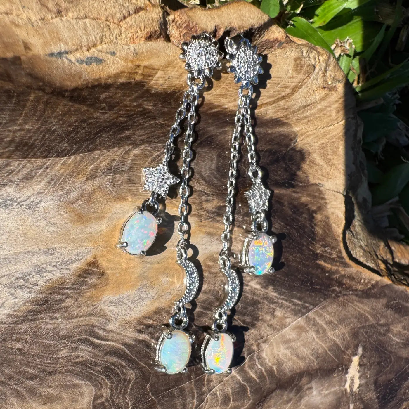 Silver opal dangle earrings featuring Coober Pedy and Lightning Ridge opals with cubic zirconia