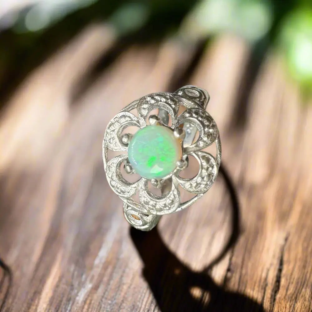 Silver ring with a 0.7ct Lightning Ridge Opal gemstone from Daintree Jewel