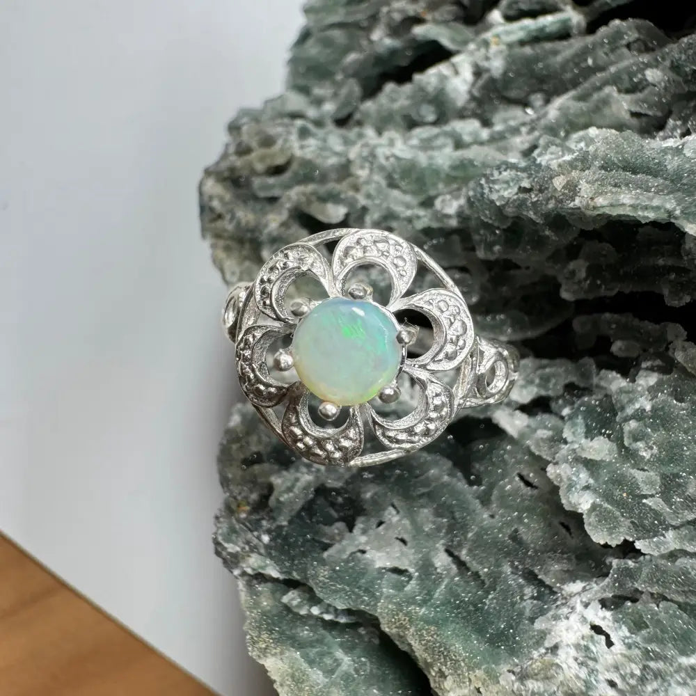 Silver ring with a 0.7ct Lightning Ridge Opal gemstone from Daintree Jewel