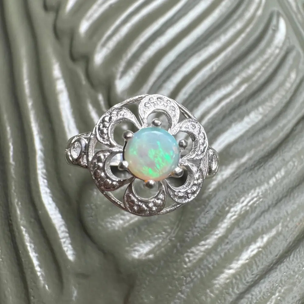 Silver ring with a 0.7ct Lightning Ridge Opal gemstone from Daintree Jewel